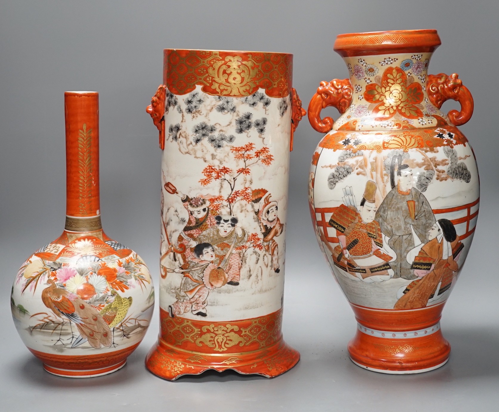 A large Japanese Kutani sleeve vase, bottle vase and another, sleeve vase 34.5 cms high